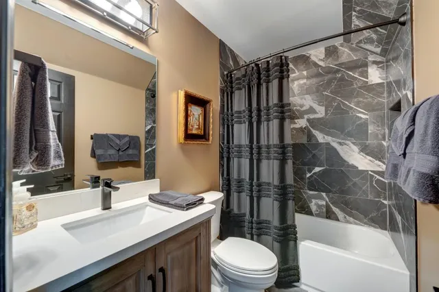a kitchen with cabinets a sink and appliances