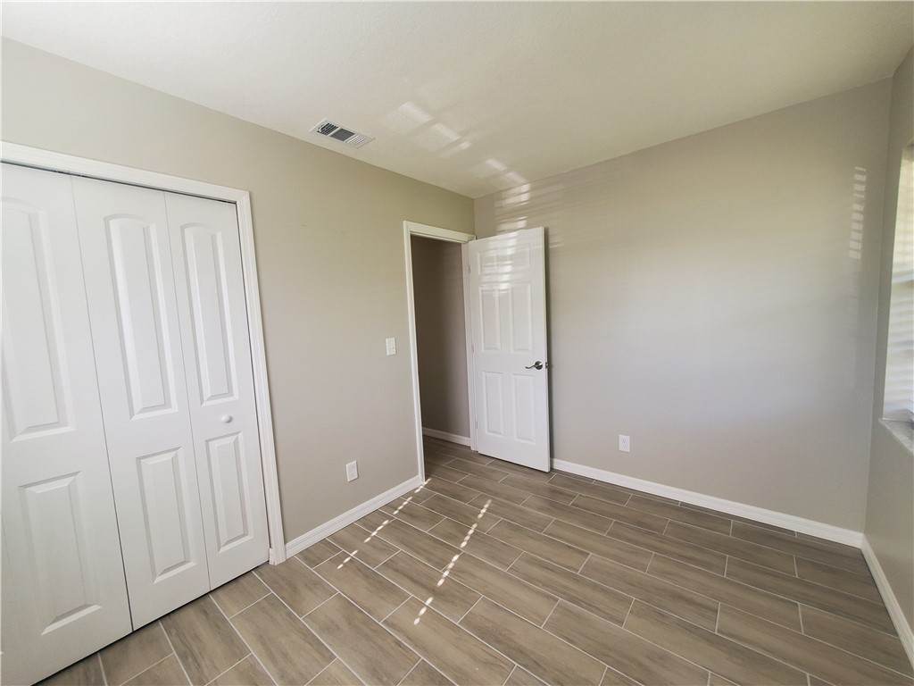3300 South 7th Street, Unit B Fort Pierce, FL 34982 - Photo 24 of 32 a view of an empty room