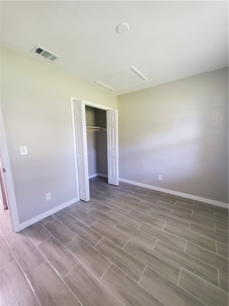 3300 South 7th Street, Unit B Fort Pierce, FL 34982 - Photo 25 of 32 a view of an empty room and window