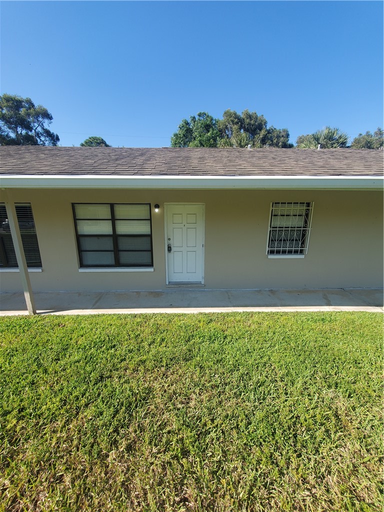 3300 South 7th Street, Unit B Fort Pierce, FL 34982 - Photo 32 of 32 a view of outdoor space with a lake view
