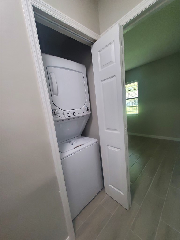 3300 South 7th Street, Unit B Fort Pierce, FL 34982 - Photo 9 of 32 a utility room with dryer and washer