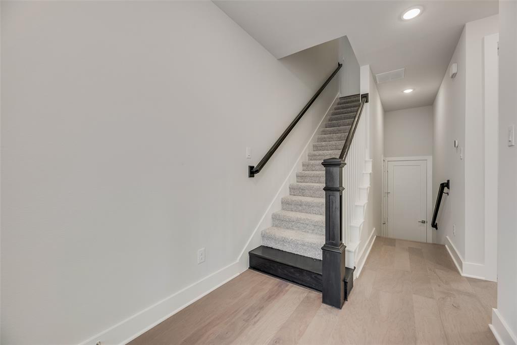 920 Ash Road Plano, TX 75075 - Photo 16 of 27 a view of entryway with wooden floor