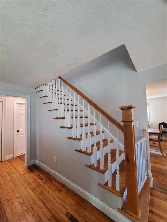 27 Upton Street Brockton, MA 02302 - Photo 13 of 24 a view of entryway with wooden floor