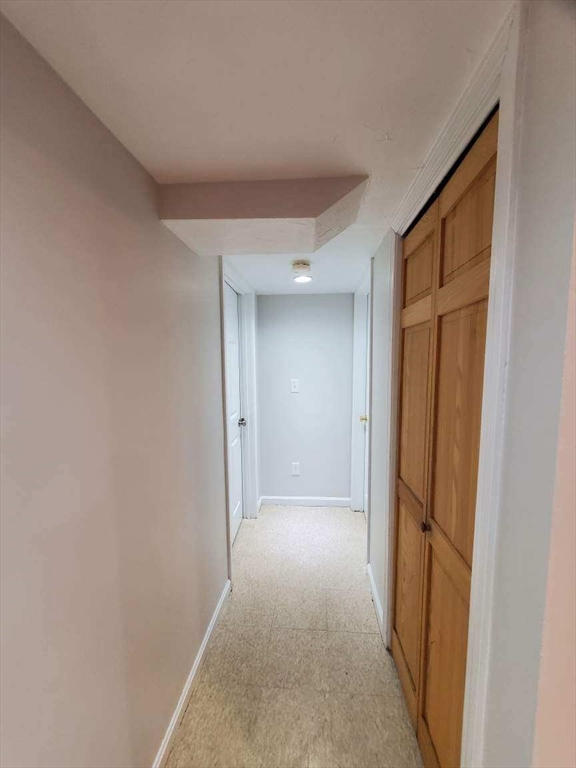 27 Upton Street Brockton, MA 02302 - Photo 14 of 24 a view of a hallway