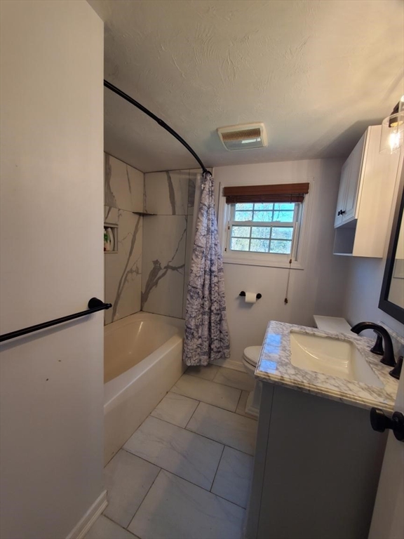 27 Upton Street Brockton, MA 02302 - Photo 17 of 24 a bathroom with a tub sink and a shower