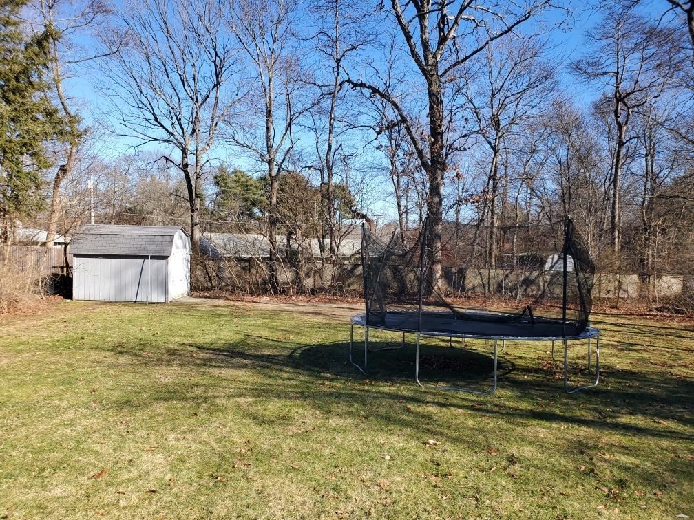27 Upton Street Brockton, MA 02302 - Photo 24 of 24 a view of a fountain in front of house