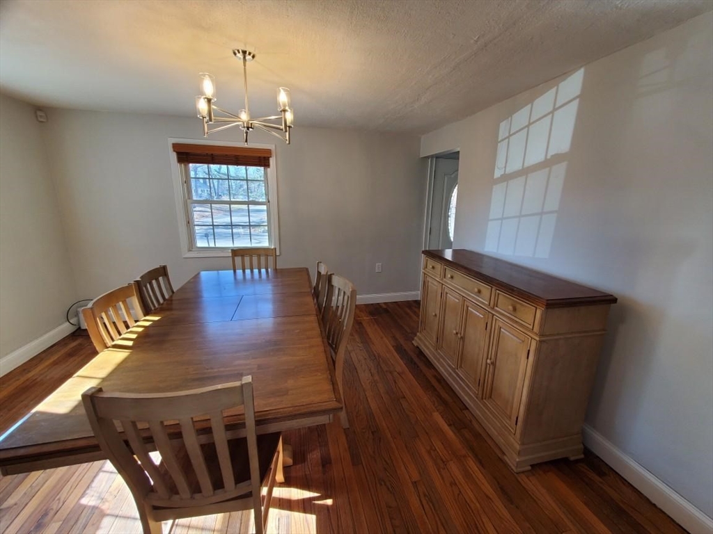 27 Upton Street Brockton, MA 02302 - Photo 7 of 24 a view of a dining room with furniture window and wooden floor