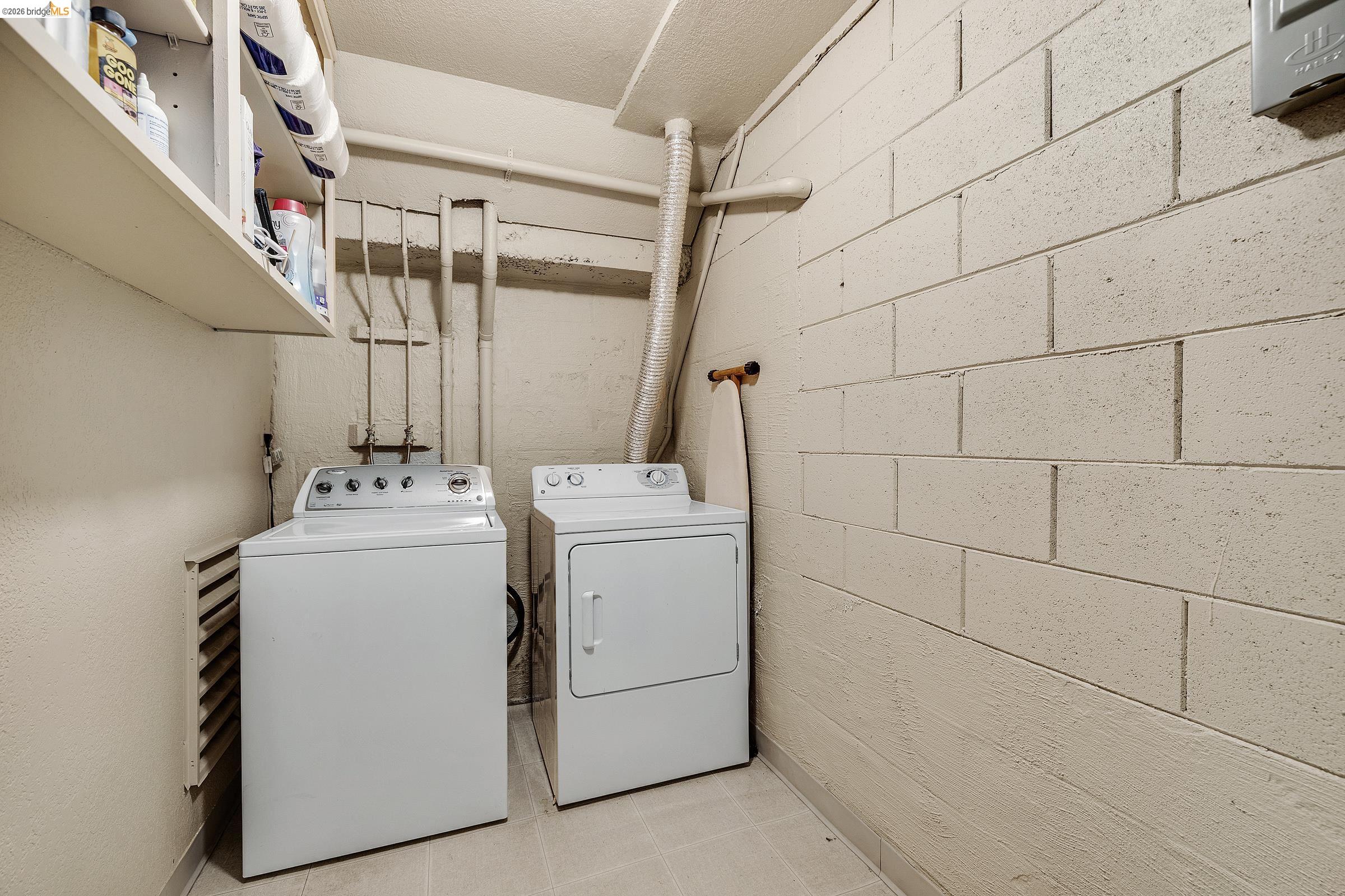 407 Vista Heights Road El Cerrito, CA 94530 - Photo 22 of 29 Laundry room featuring washer and dryer