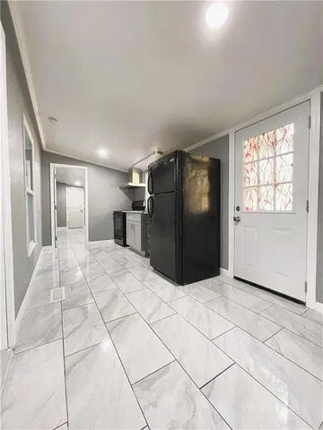 a view of entryway with a front door