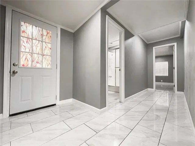 a view of a livingroom with a dishwasher and a cabinets