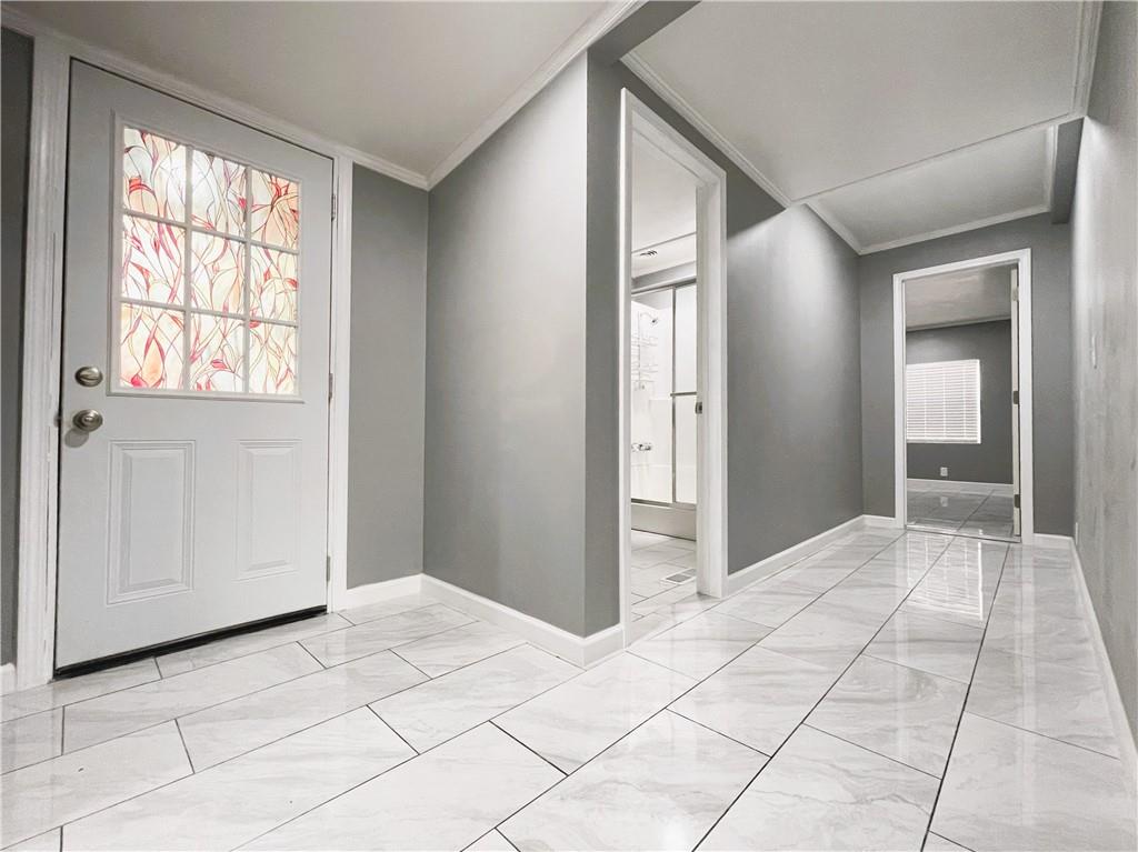 6225 Lollis Creek Road Flowery Branch, GA 30542 - Photo 30 of 36 a view of entryway with a front door