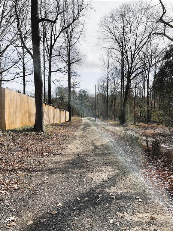 6225 Lollis Creek Road Flowery Branch, GA 30542 - Photo 36 of 36 a view of outdoor space with trees