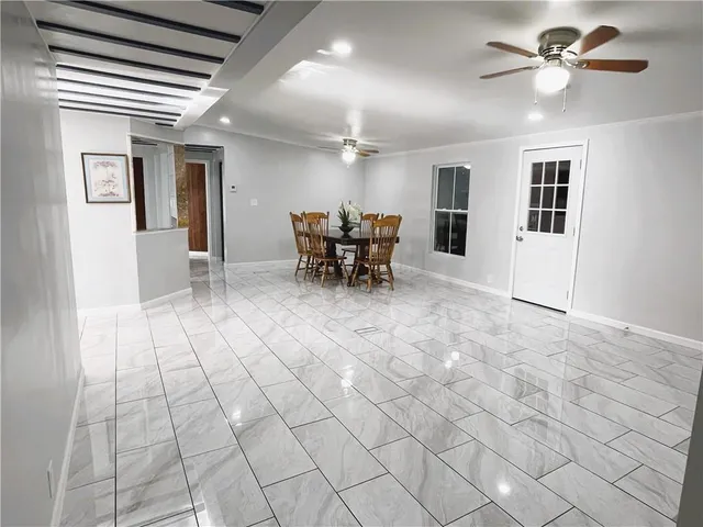 a hallway with a black white checkered floor
