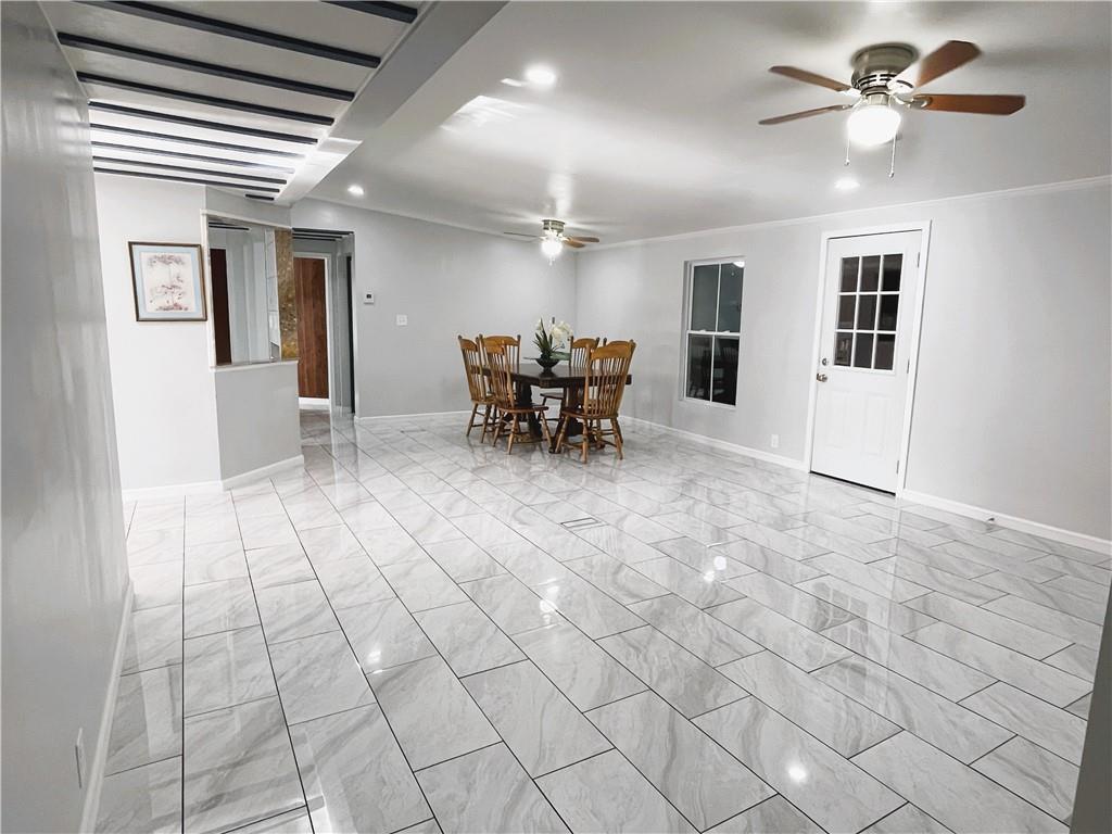 6225 Lollis Creek Road Flowery Branch, GA 30542 - Photo 9 of 36 a view of a livingroom with couch