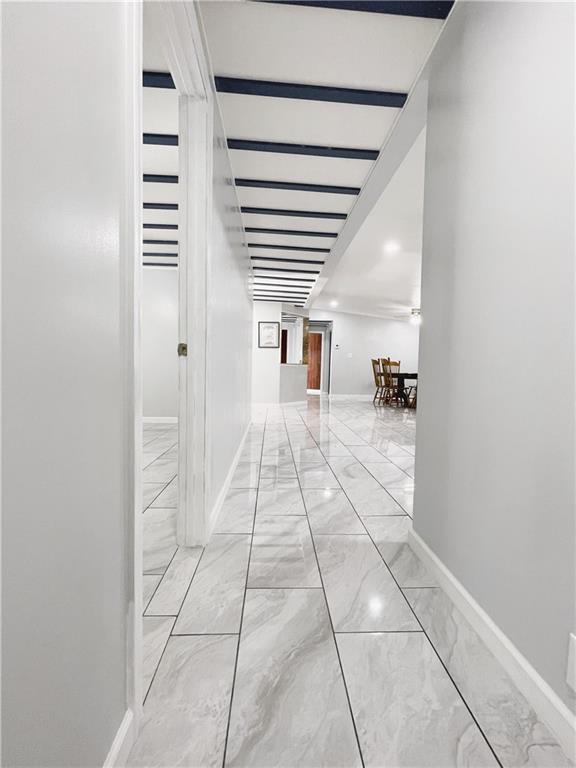 6225 Lollis Creek Road Flowery Branch, GA 30542 - Photo 10 of 36 a hallway with a black white checkered floor