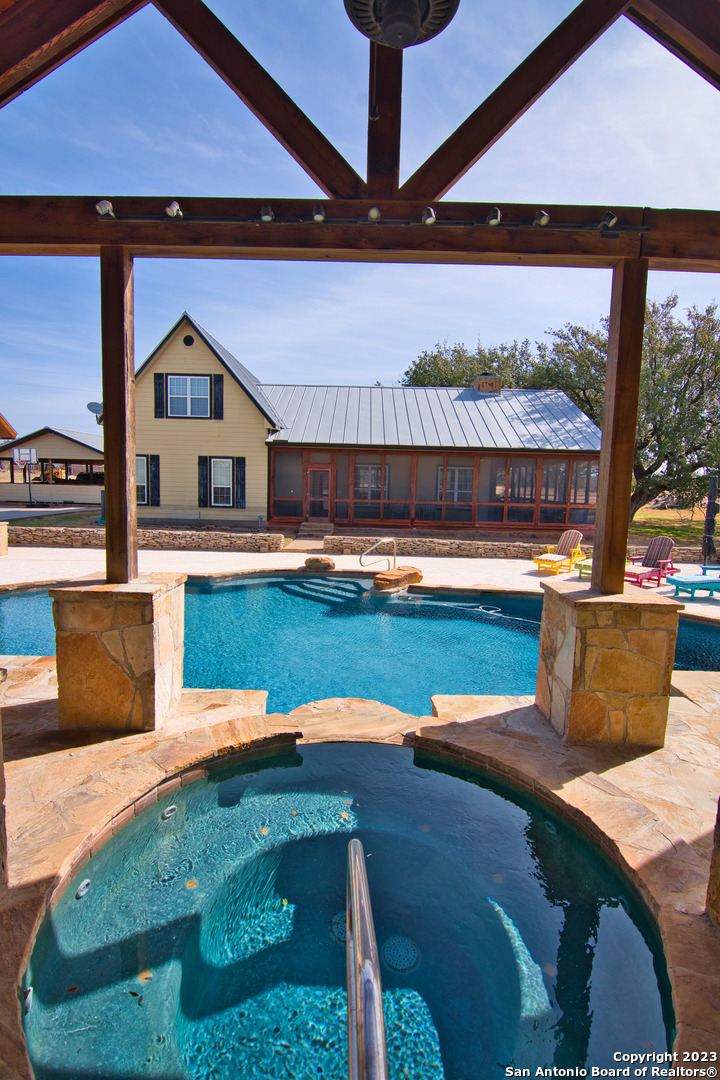 19316 Ranch Road 1871 Mason, TX 76856 - Photo 12 of 37 a view of swimming pool with a yard