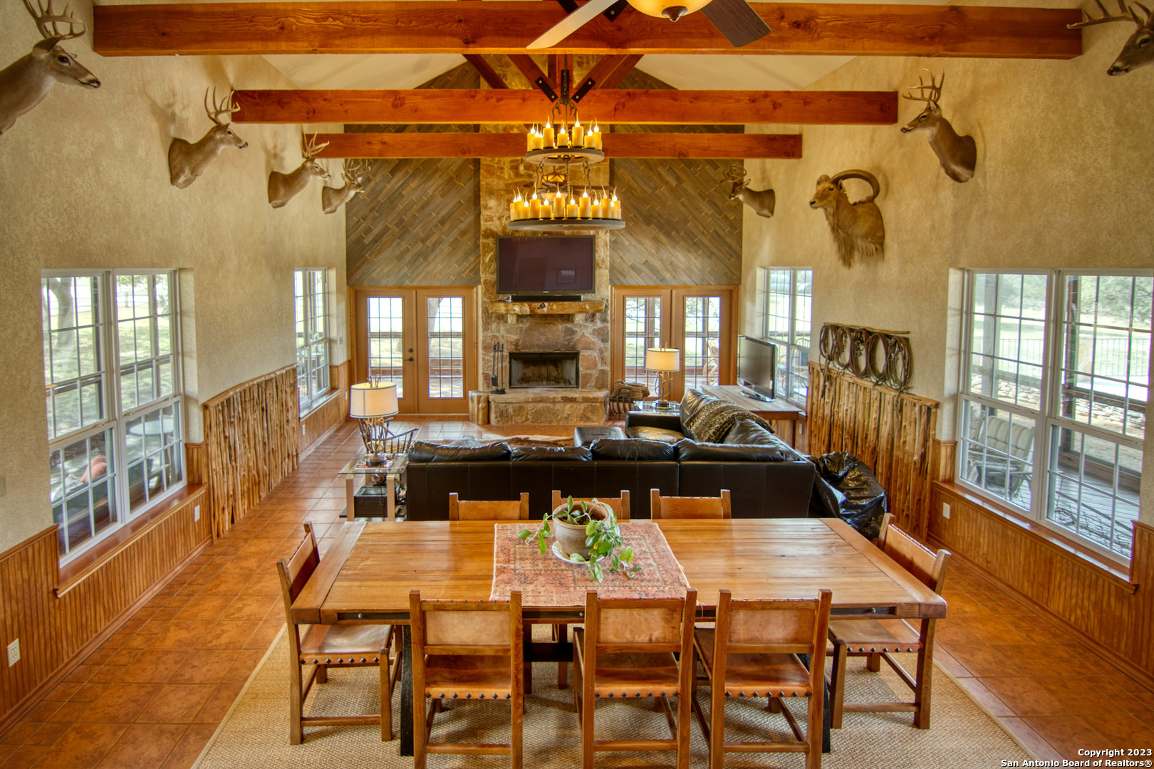 19316 Ranch Road 1871 Mason, TX 76856 - Photo 19 of 37 a view of a dining area with furniture and a floor to ceiling window