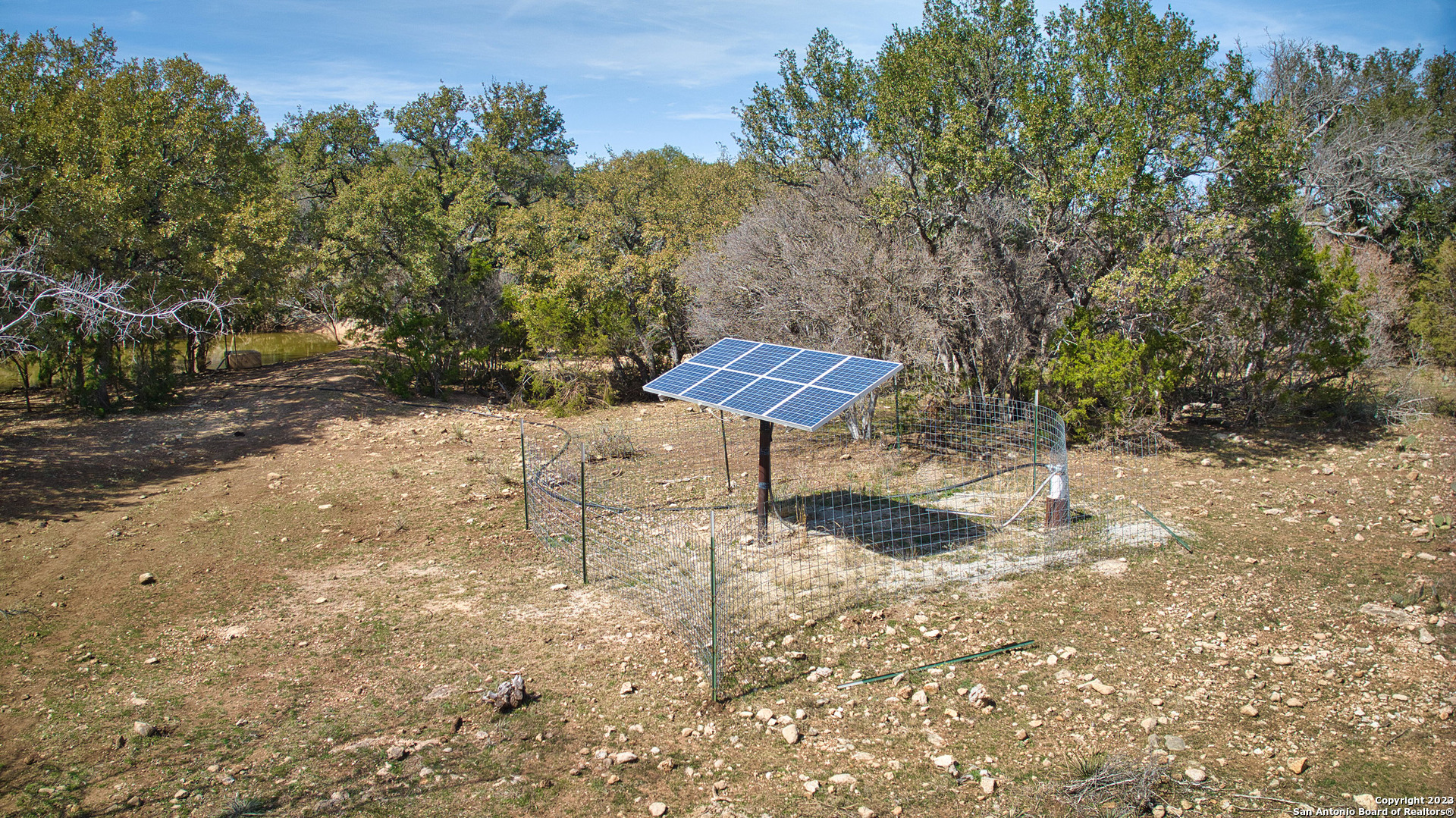 19316 Ranch Road 1871 Mason, TX 76856 - Photo 32 of 37 a backyard of a house with table and chairs