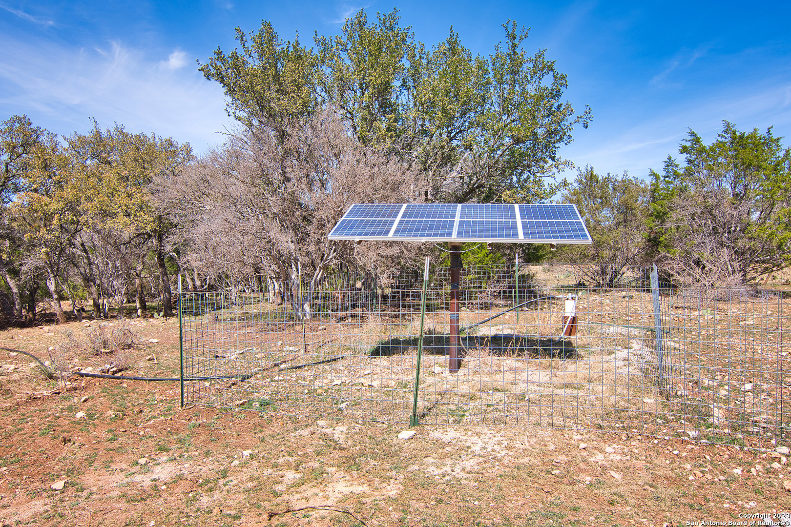 19316 Ranch Road 1871 Mason, TX 76856 - Photo 36 of 37 a backyard of a house with table and chairs
