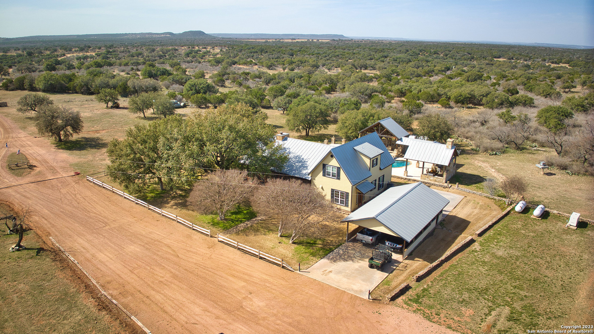 19316 Ranch Road 1871 Mason, TX 76856 - Photo 7 of 37 an aerial view of residential houses with outdoor space