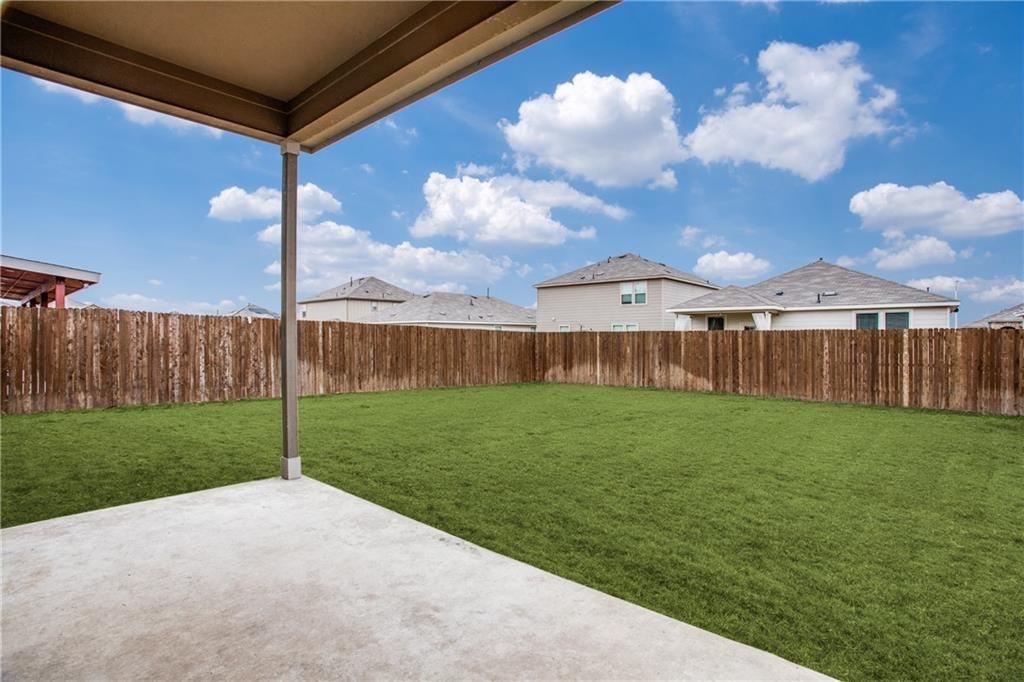 1413 Cliffbrake Way Georgetown, TX 78626 - Photo 23 of 30 a view of a porch with a big yard