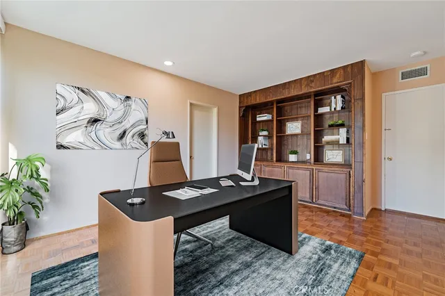 a bedroom with a bed and a couch