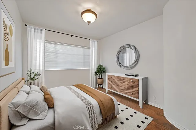 a bathroom with a sink a mirror and a shower