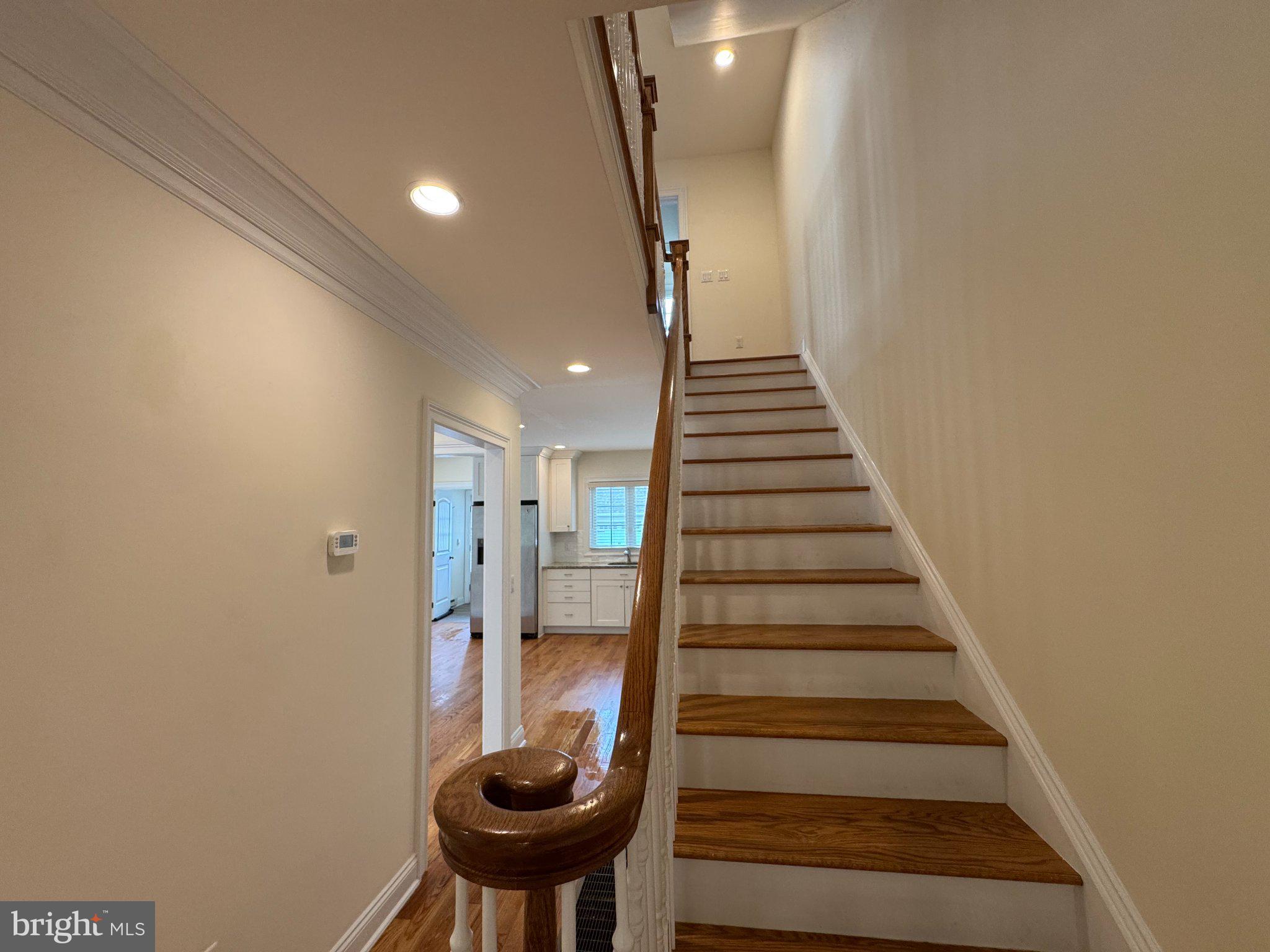 16 Harris Road Princeton, NJ 08540 - Photo 14 of 25 Inviting staircase in a bright hallway.