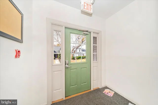 a view of a hallway with closet