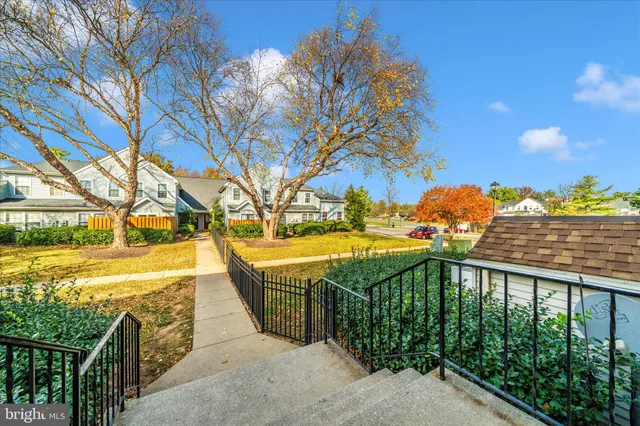 a view of a swimming pool with a lounge chairs