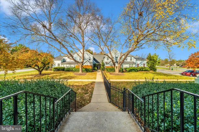 a view of a balcony with trees