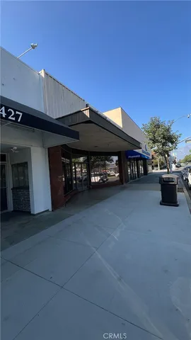 a view of a chairs and table in the patio