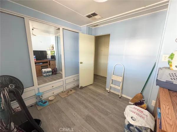 a hallway with table and chairs