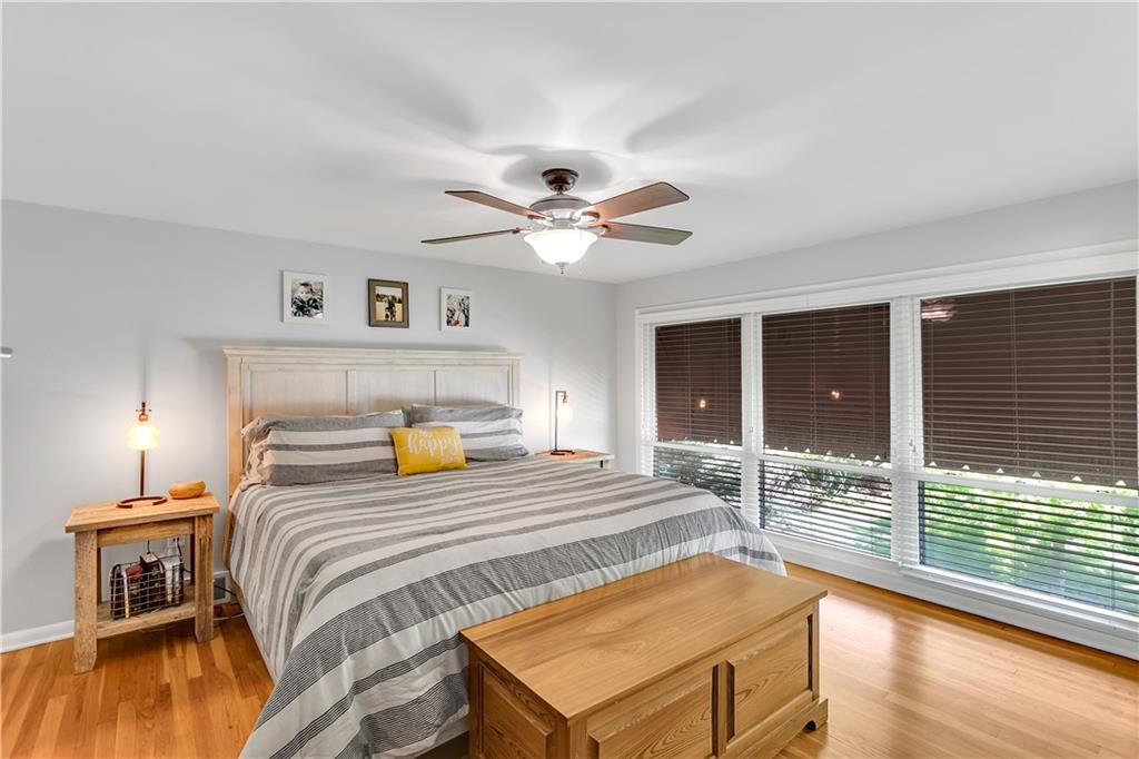 1560 2nd Street Beaver, PA 15009 - Photo 24 of 37 a bedroom with a bed and wooden floor