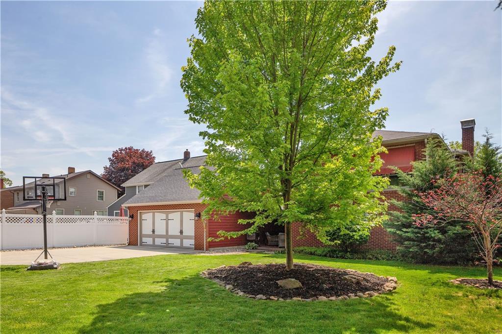 1560 2nd Street Beaver, PA 15009 - Photo 35 of 37 a view of a house with a yard and a large tree