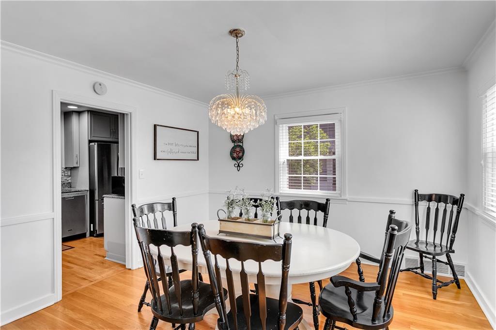 1560 2nd Street Beaver, PA 15009 - Photo 6 of 37 a view of a dining room with furniture window and wooden floor