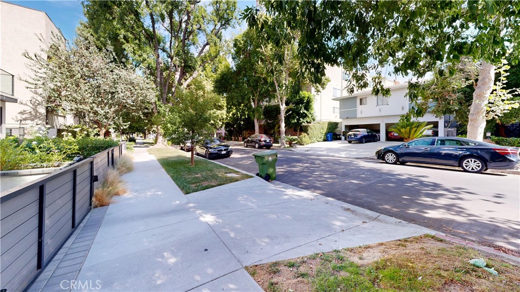 14569 Benefit Street, Unit 102 Sherman Oaks, CA 91403 - Photo 5 of 24 a view of a street with cars on road