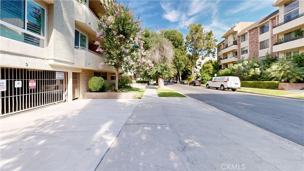 14569 Benefit Street, Unit 102 Sherman Oaks, CA 91403 - Photo 6 of 24 a view of street with cars