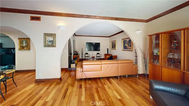 a kitchen with stove and cabinets