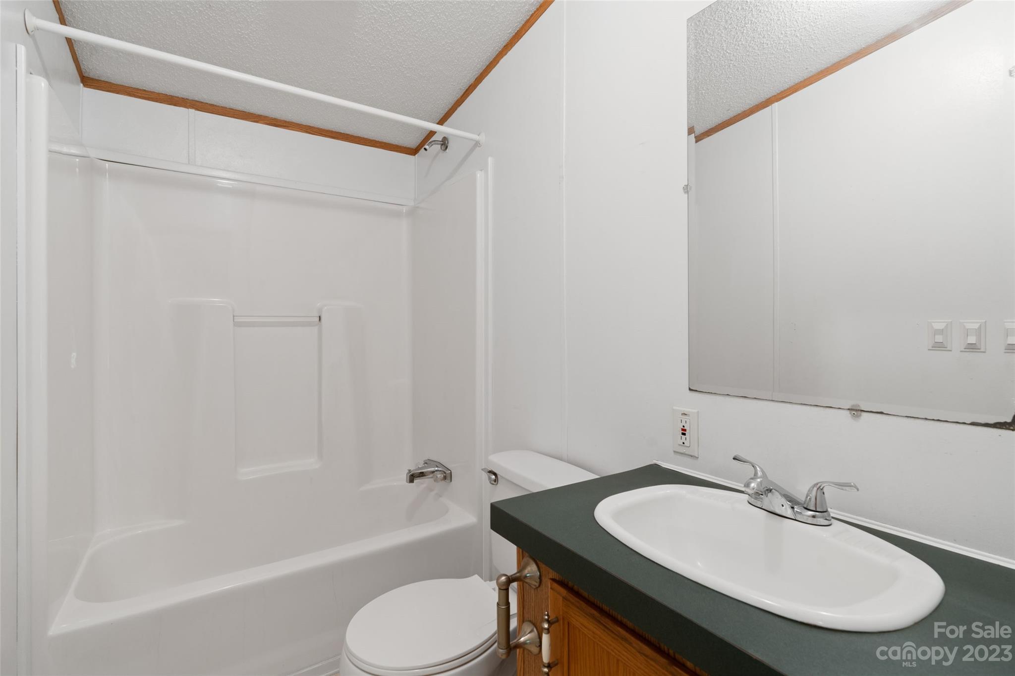 100 Lansing Road Waynesville, NC 28786 - Photo 11 of 11 a bathroom with a sink and a mirror
