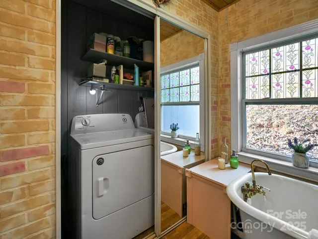 a utility room with dryer and washer