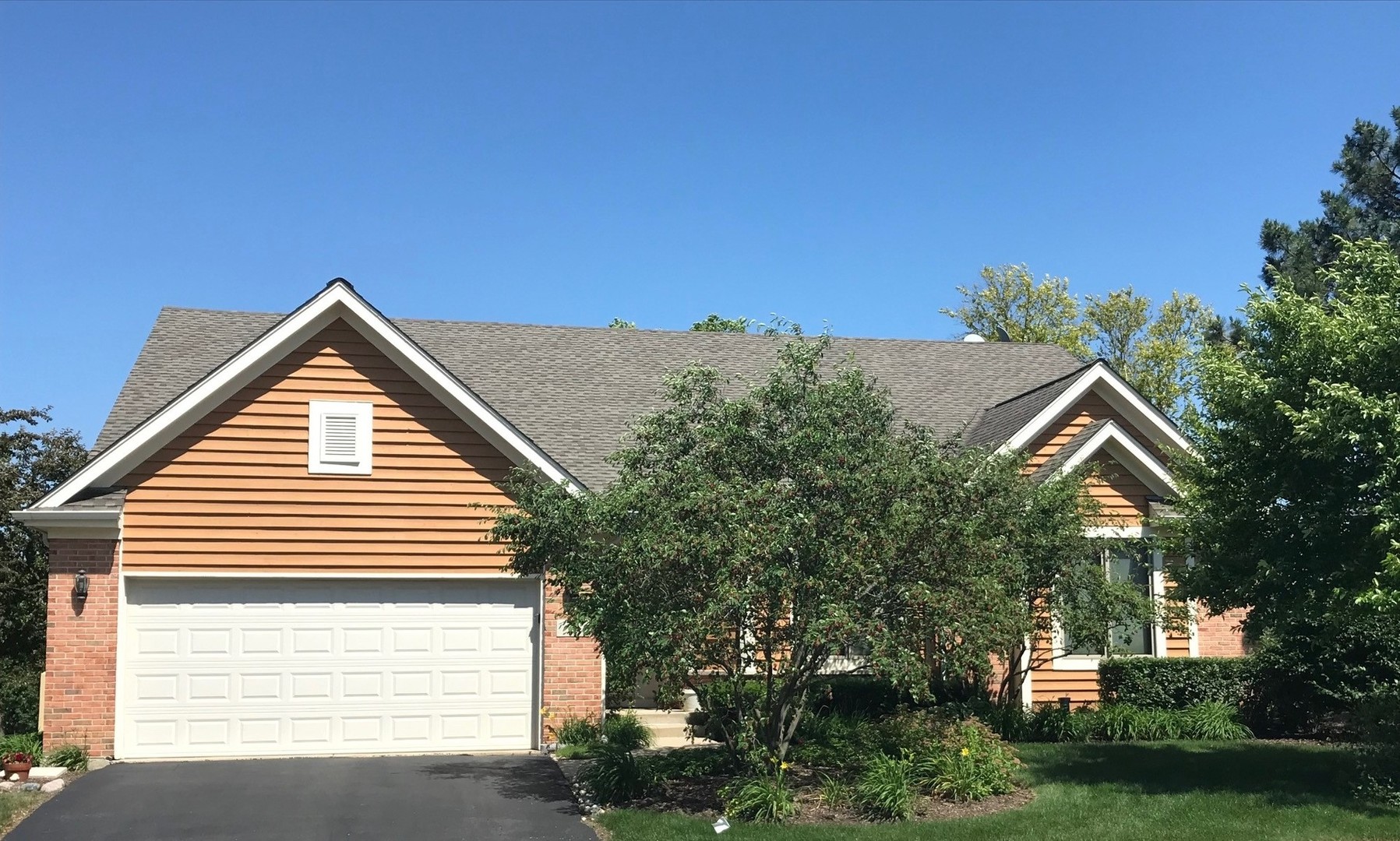 6 Olympic Court Lake In The Hills, IL 60156 - Photo 1 of 32 a view of a house with a garage