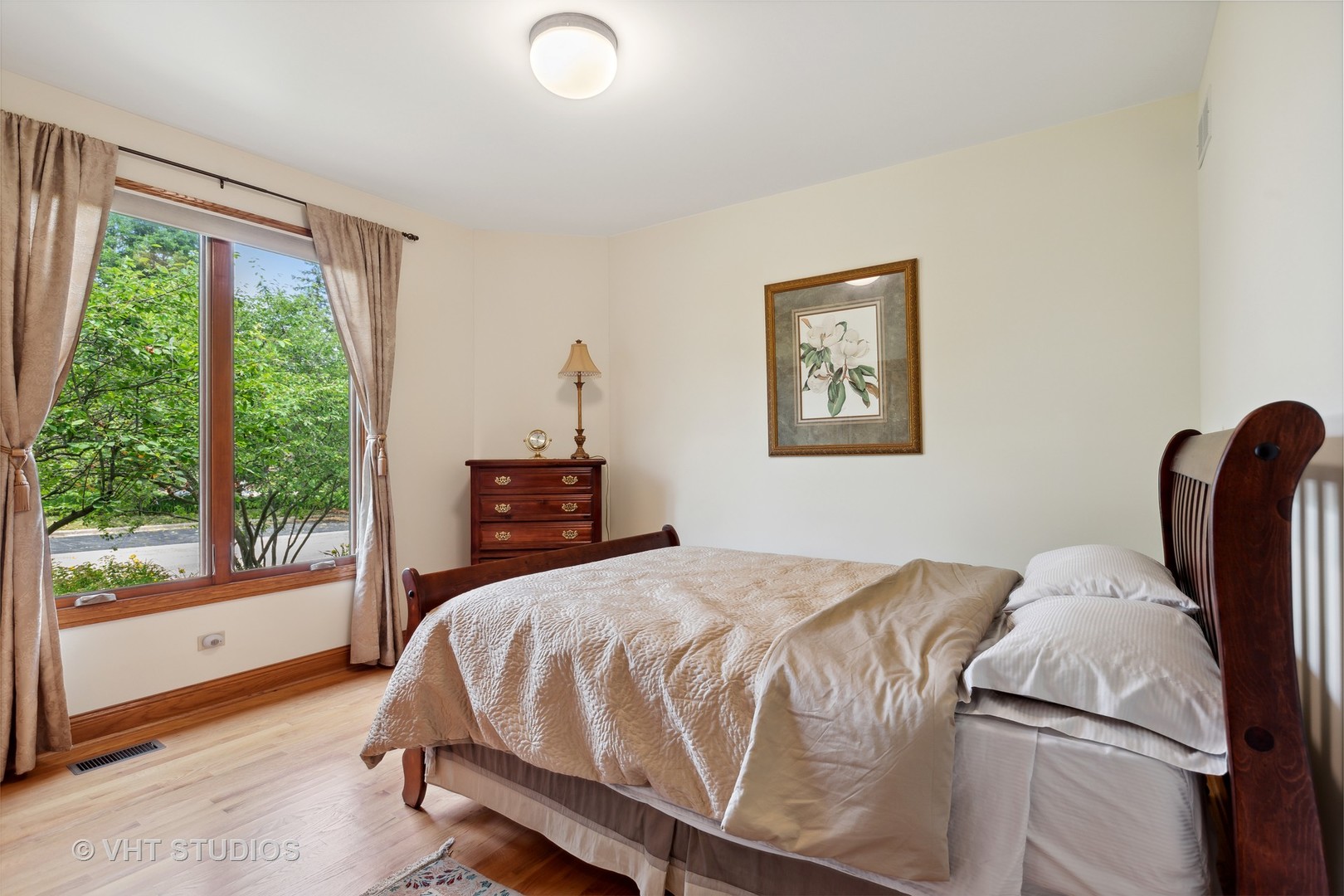 6 Olympic Court Lake In The Hills, IL 60156 - Photo 13 of 32 a bedroom with a bed and wooden floor