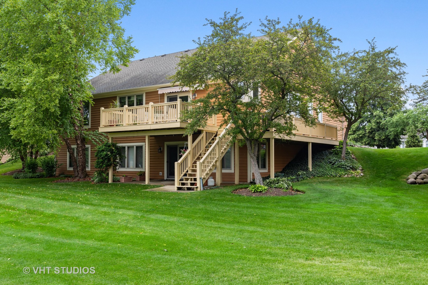 6 Olympic Court Lake In The Hills, IL 60156 - Photo 18 of 32 a view of a house with a yard porch and sitting area