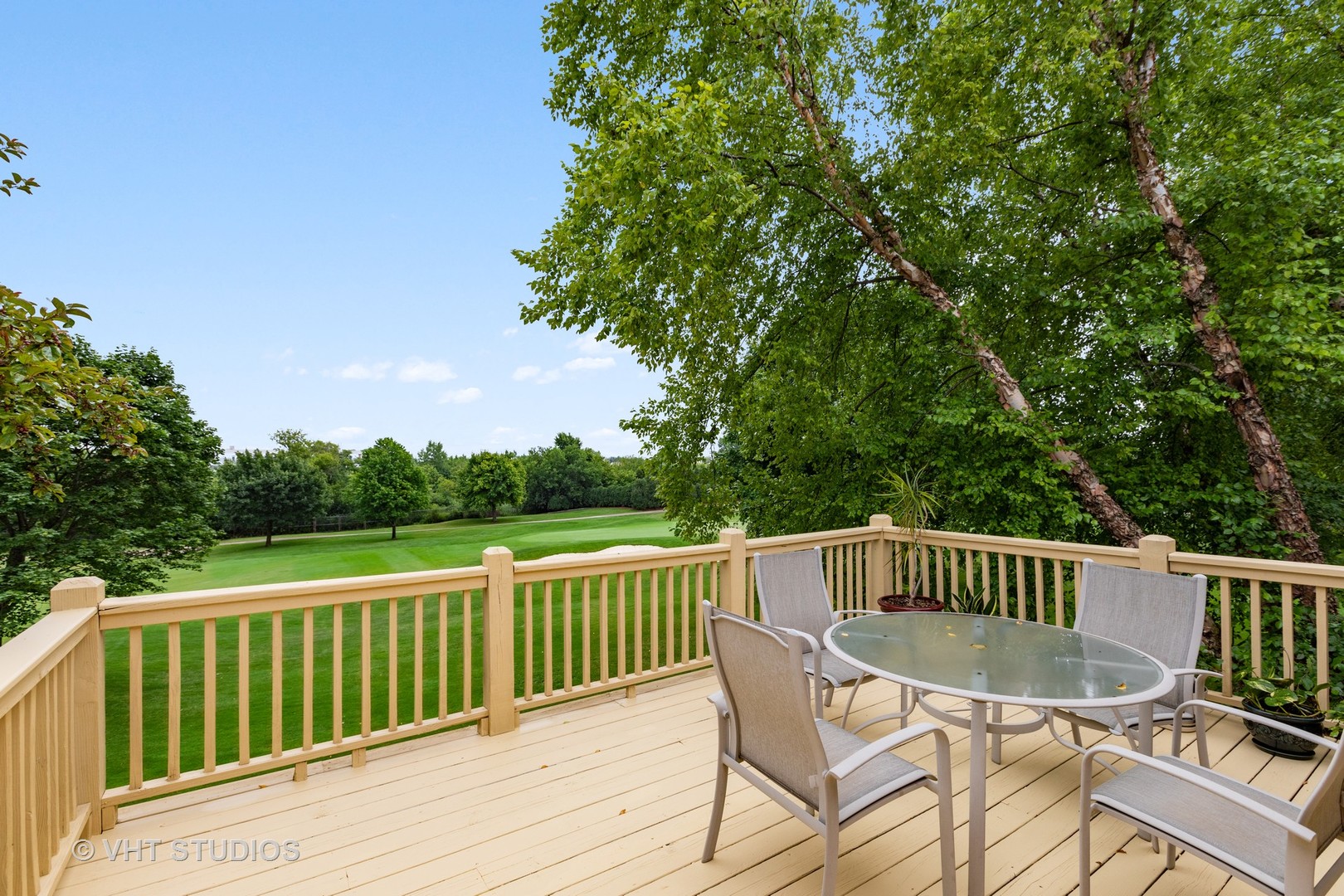 6 Olympic Court Lake In The Hills, IL 60156 - Photo 20 of 32 a view of a chair and table on the deck