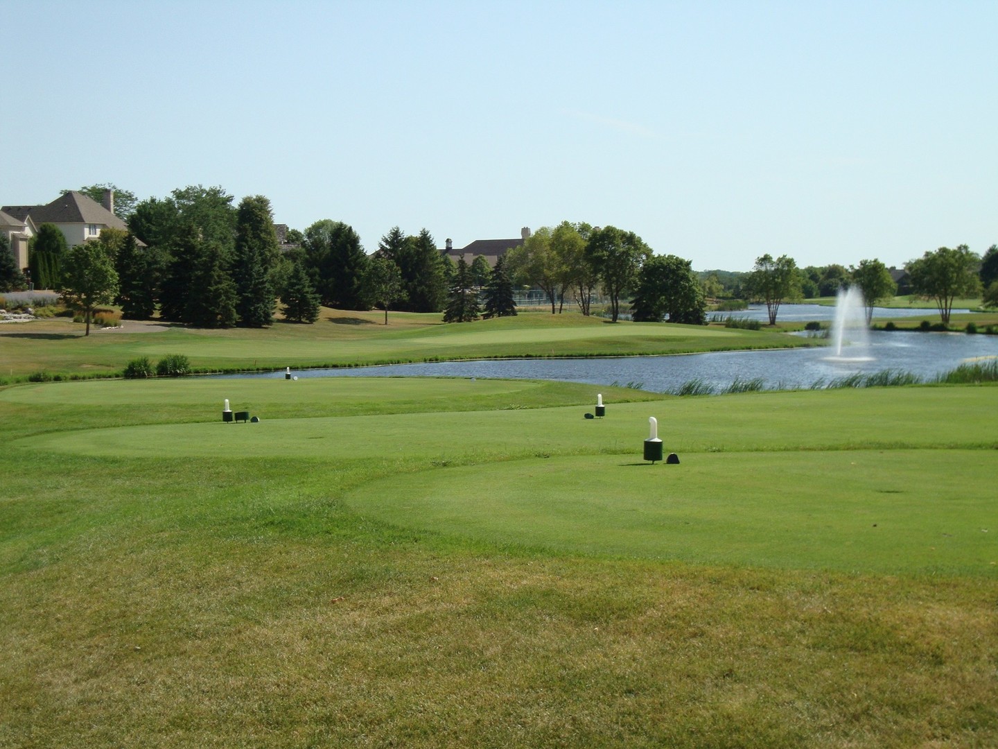 6 Olympic Court Lake In The Hills, IL 60156 - Photo 32 of 32 a view of a golf course with a lake