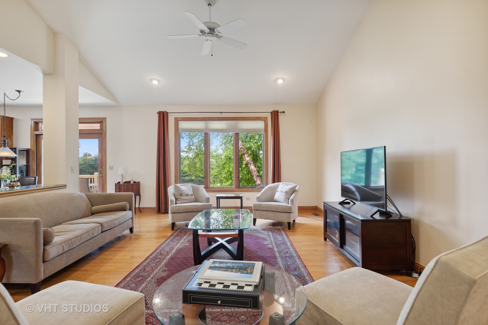 6 Olympic Court Lake In The Hills, IL 60156 - Photo 5 of 32 a living room with furniture a rug and a window