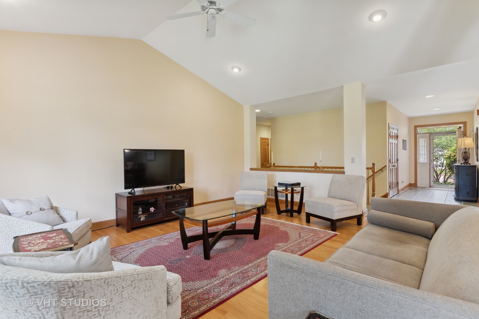 6 Olympic Court Lake In The Hills, IL 60156 - Photo 6 of 32 a living room with furniture and a flat screen tv