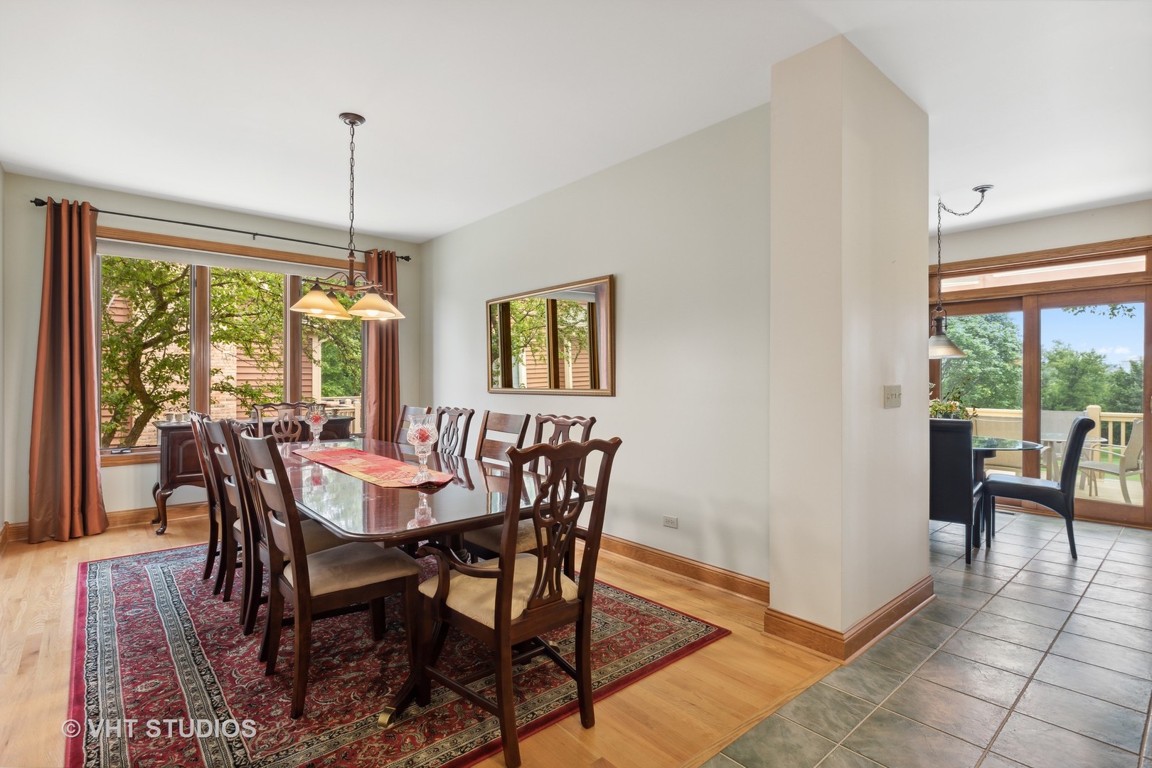 6 Olympic Court Lake In The Hills, IL 60156 - Photo 9 of 32 a view of a dining room with furniture window and wooden floor