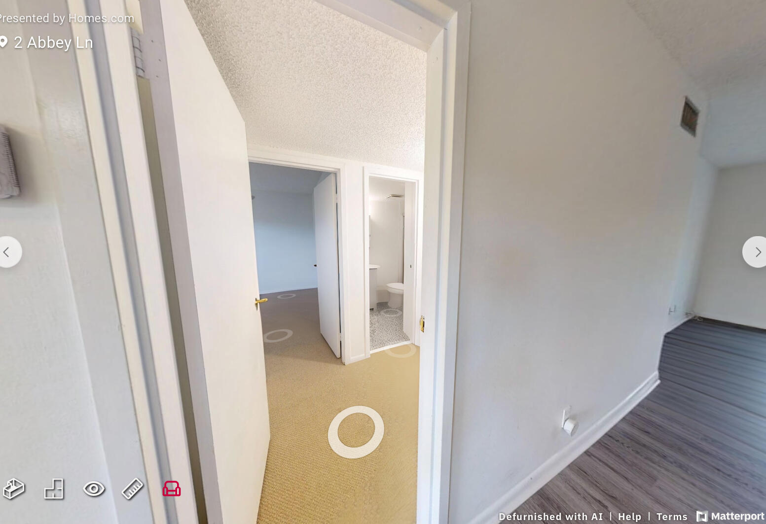 2 2 Abbey Lane, Unit 203 Delray Beach, FL 33446 - Photo 15 of 22 a view of a hallway with wooden floor